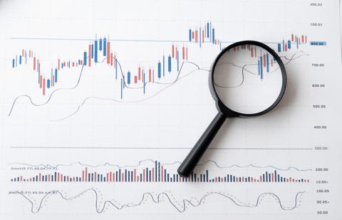 A magnifying glass over an error rate graph