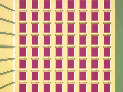 Sensor chip is a yellow grid with pink squares and green along the edges.