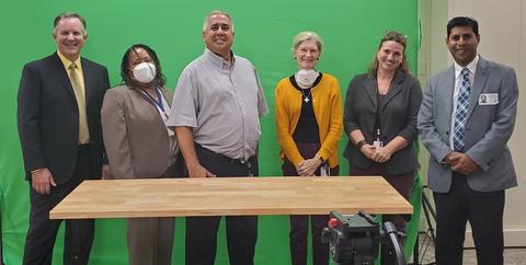 Group photo of Don Onwiler, G. Diane Lee, David Sefcik, Tina Butcher, Katrice Lippa, and Mahesh Albuquerque in front of green screen in Studio 220.