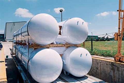 tanks on the bed of a truck