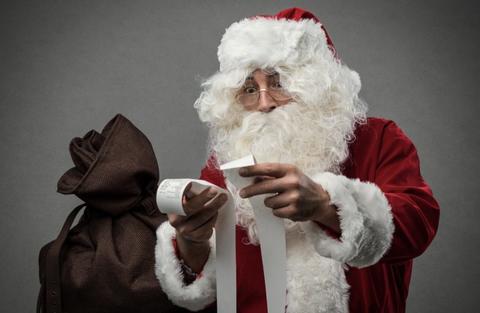 Santa checking receipts
