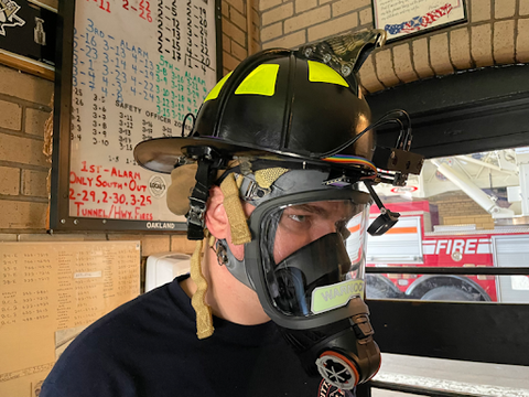 Firefighters wearing the Extreme Reality helmet with the thermal interface