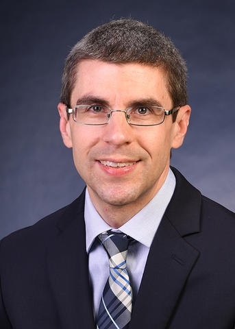 Dr. Christopher Szakal
