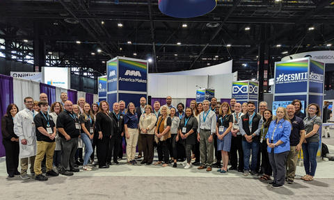 Group photo of Manufacturing USA partners at IMTS 2022.