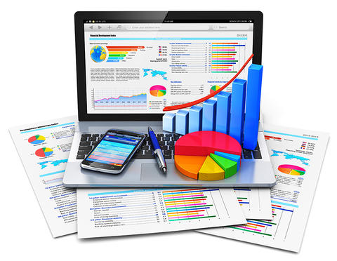 Results image showing a laptop sitting on paper showing results.