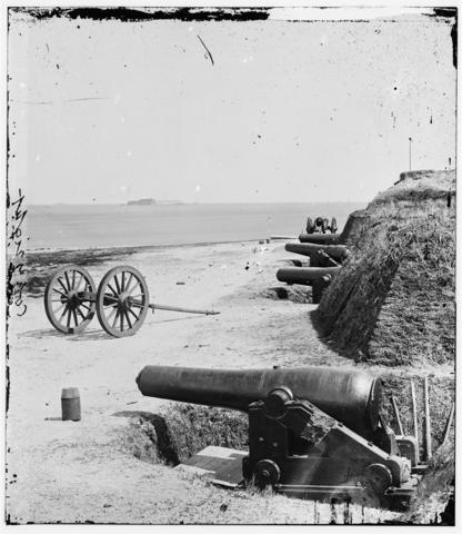 A gun battery at Fort Johnson, South Carolina, in 1865. Fort Sumter can be seen on an island in the background.