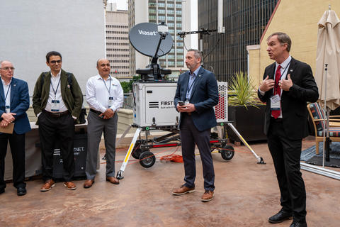  FirstNet Authority Executive Director/CEO speaks to his staff in front of a FirstNet Compact Rapid Deployable.