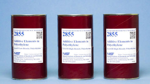 Photograph of three labeled bottles of SRM 2855 containing low-density and high density polyethylene