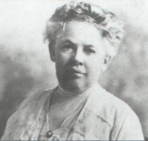 Historical photo shows head-and-shoulders view of Mary Lemist Titcomb. 