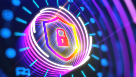 Image of a lock on a shield with a multicolored circles in the background to represent cybersecurity.