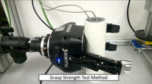 Grasp strength test method with split cylinder artifact