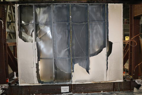 Steel wall with covering burned off