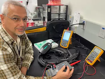 Mike Stocker working with EVSE equipment