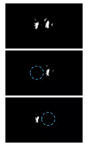 Three microscope images arranged vertically show ions as white dots on a black background.