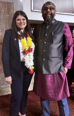 man and woman standing together