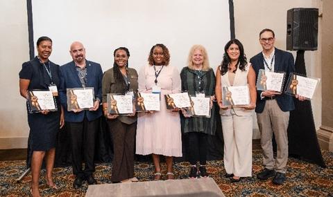 Staff members from Wellstar pose for a photo upon receiving an Alliance award
