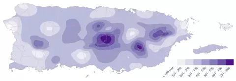 Map of Puerto Rico shows denser colors near the center and has rainfall mm key