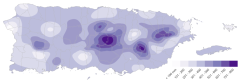 Map of Puerto Rico shows denser colors near the center and has rainfall mm key