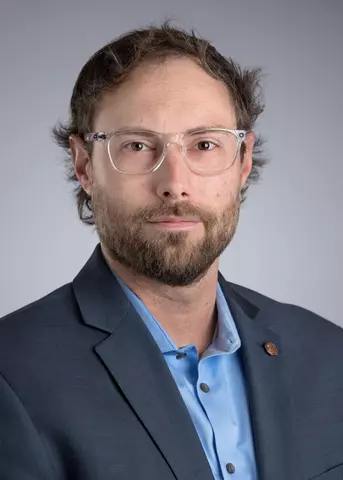 Adam J. Fleisher