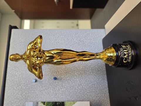 photo of golden figure trophy for CMUF Award