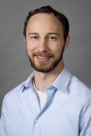 Portrait photograph of Newell Moser