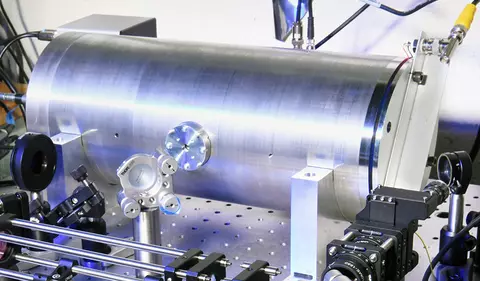 Combined acoustic resonator and optical cavity