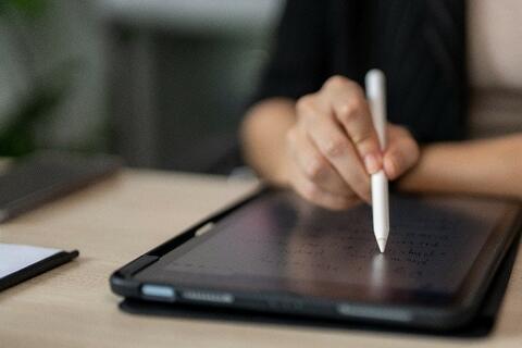 person with tablet