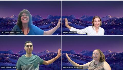 Screenshot from a virtual meeting with Wendi Copello (top-left), Willa Mayns (top-right), Andrew Uribe (bottom-left), and Robin McHale (bottom-right) smiling for a group photo and posed in a virtual high-five by placing a hand against the inside vertical edge of each of their respective video frames. 