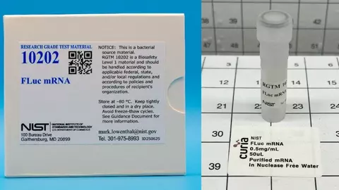 Reference Grade Test Material 10202 FLuc mRNA.  The outer box with a description of the material is shown (left side), along with a vial of the material (right side).