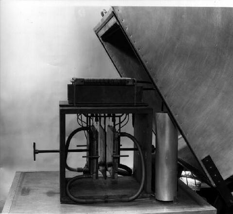 black and white photo of a boxlid apparatus