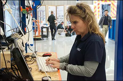 Ann Virts, NIST technician and test methods developer, at console