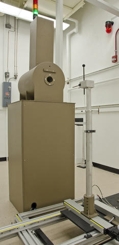 The cesium-137 is enclosed in the brown metal irradiator unit.