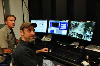 Paul Williams and Joshua Hadler operating the NIST calibration service for high-power lasers.