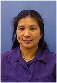Li Piin Sung, a person with long black hair, smiles for the camera.