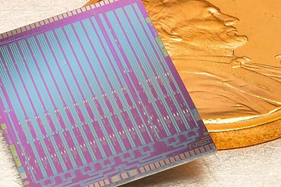 Josephson voltage standard chip with penny for scale