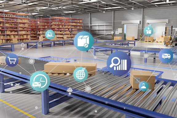 Boxes on a conveyor belt in a warehouse are overlaid with icons representing transportation and logistics.
