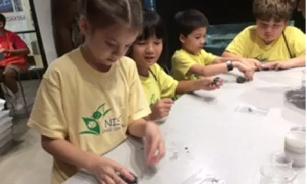 CCC campers exploring the world of STEM. 