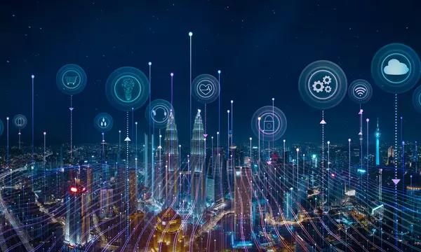 Panorama aerial view in the cityscape skyline with smart services and icons, internet of things, networks and augmented reality concept , night scene .
