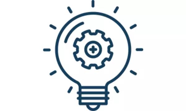 A line drawing of a gear inside a lightbulb