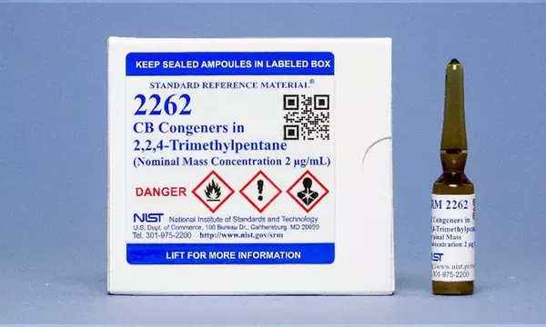 Photograph of a unit of SRM 2262 consisting of a labeled box and a labeled amber vial.
