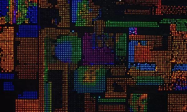 A complex pattern of pixels with different colors