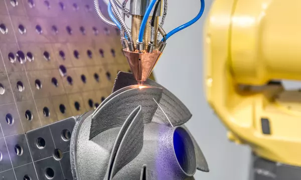 a 3D metal printer produces a complex steel part
