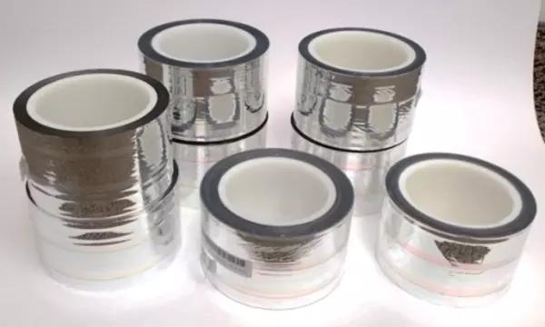 5 metallic cylindrical shapes