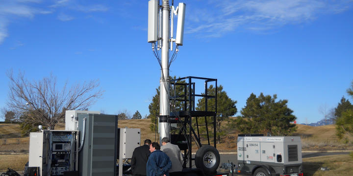 Photo of NIST scientists with the PSCR Deployable LTE Cell-on-Wheels