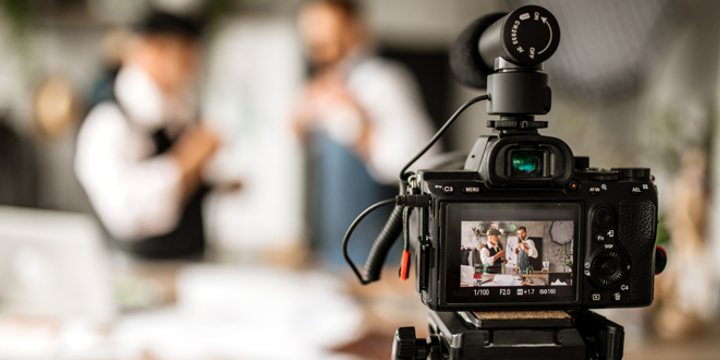 manufacturing workers filming a company video