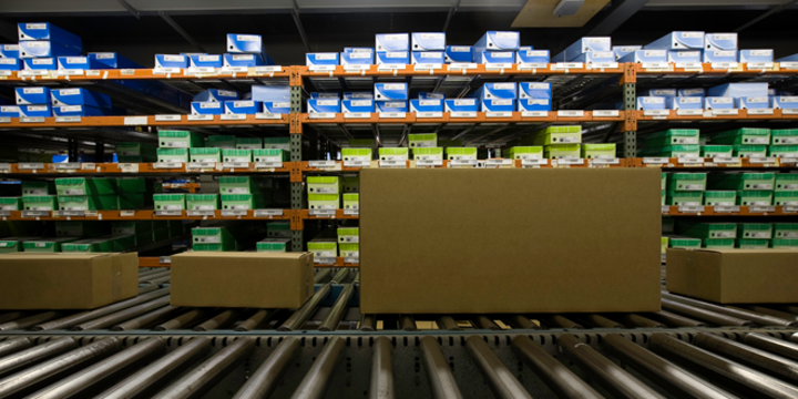 Image of warehouse full of boxes in green and blue