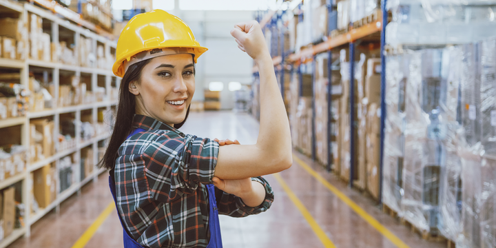 Powerful young industrial worker woman