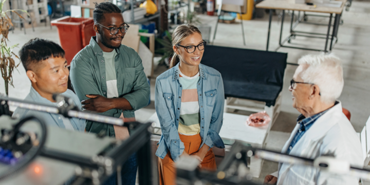 Students in a manufacturing facility