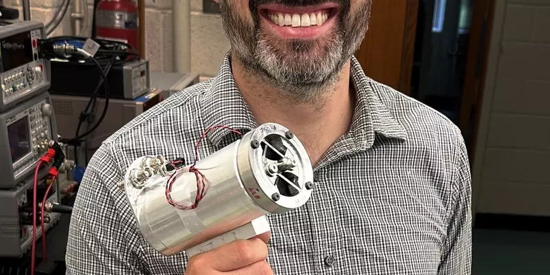 NIST researcher Jared Strait with a prototype hand-held KDFR