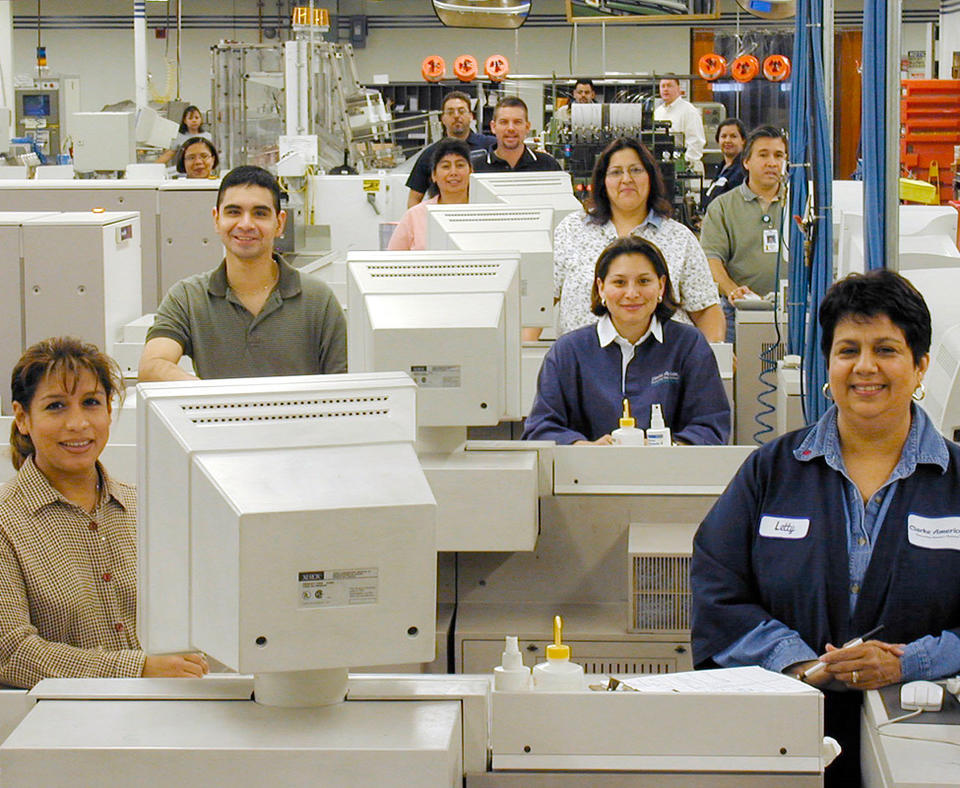 Clarke American Checks, Inc. photo of manufacturing employees.